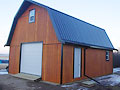 TImberframe hip roof barn with insulated panels